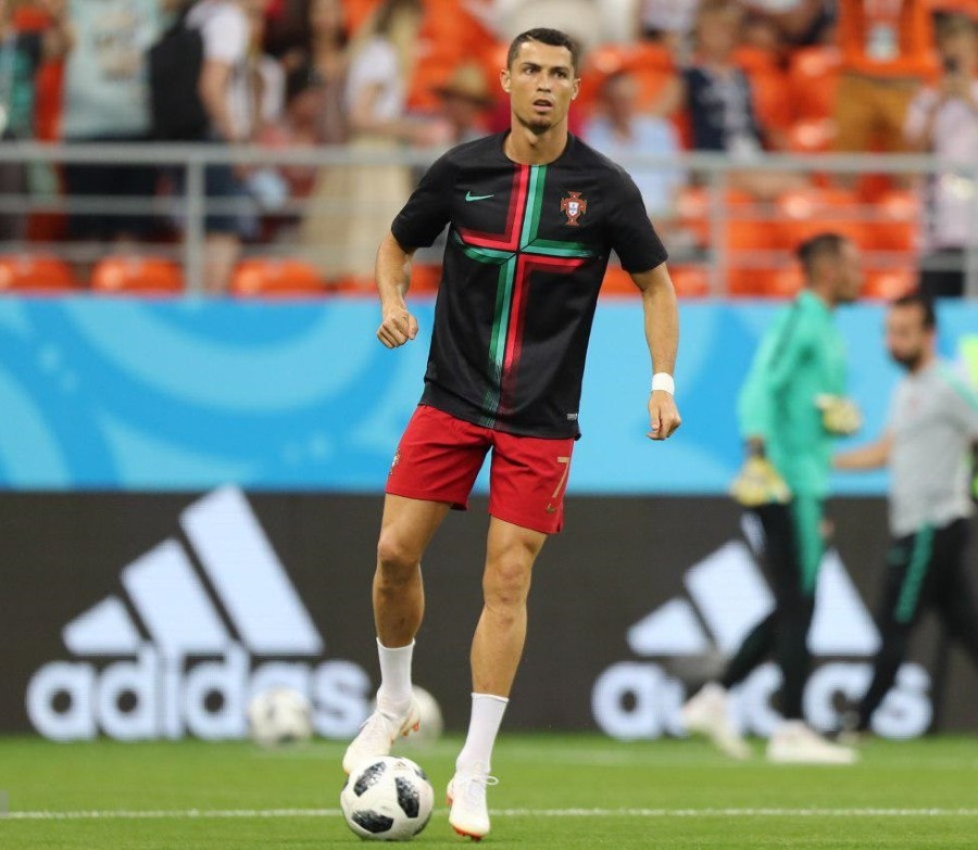 Cristiano Ronaldo playing in Portugal jersey.