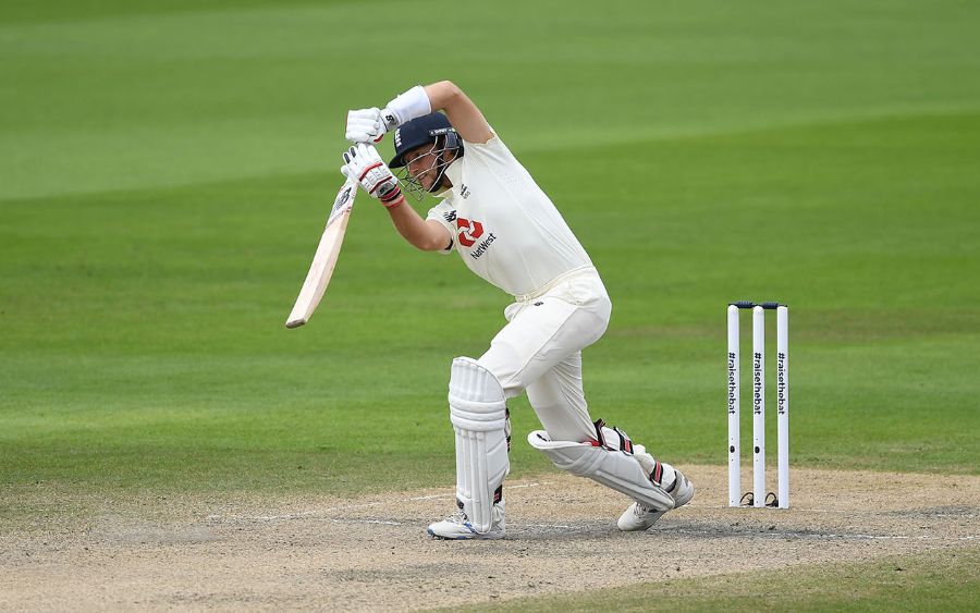 English cricketer Joe Root playing a straight drive.